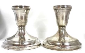 Pair of Elizabeth II silver dwarf candlesticks, loaded, Birmingham 1995, makers mark for L J