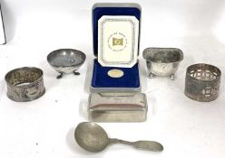 Mixed Lot: A Victorian silver trench salt on four ball feet, no liner, a Victorian serviette ring, a
