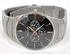 A Skagen gents quartz chronograph wrist watch with original box, the watch has a stainless steel