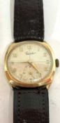 A 9ct gold Everite gents wrist watch, the watch has a manually crown wound 15 jewel movement,