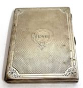A Victorian card case with bright cut engine turned decoration around a monogram, fitted interior,