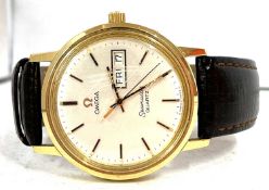 An Omega Seamaster Quartz, the watch has a gold plated case, quartz movement and features a silver