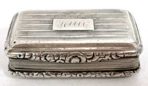 An antique silver snuff box with reeded decoration around an initialled cartouch, the edges