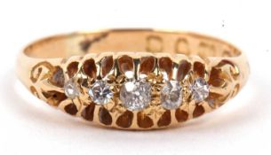 Antique 18ct gold five stone diamond ring featuring five graduated old round cut diamonds all in a