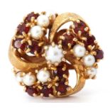 9ct gold seed pearl and garnet cluster ring, a circular tied ribbon design decorated with ten
