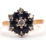 Sapphire and diamond cluster ring, a flower head design, stamped 18, size L