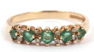 9ct gold emerald and diamond half eternity ring set with five small graduated round cut emeralds