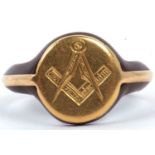 An antique Masonic gold and tortoiseshell ring, circa 1900, the round panel engraved with a set