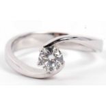 A precious metal single stone diamond ring featuring a round brilliant cut diamond, 0.40ct approx,