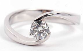 A precious metal single stone diamond ring featuring a round brilliant cut diamond, 0.40ct approx,