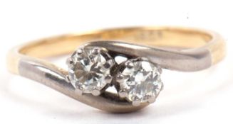 Two stone diamond crossover ring, the side by side round brilliant cut diamonds of 0.30ct total