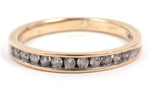 Modern diamond half eternity ring chanel set with twelve small round single cut diamonds and stamped