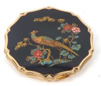 A vintage Stratton compact featuring a golden pheasant and floral detail to the hinged lid, 8.5cm