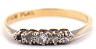 Four stone diamond ring featuring four small graduated single cut diamonds (one missing), stamped