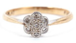 Vintage small diamond cluster ring featuring seven small diamonds in illusion setting, stamped 9ct