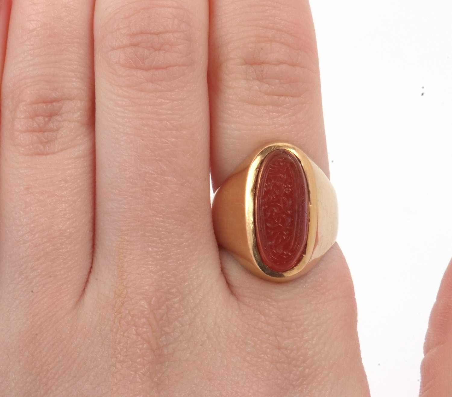 High grade yellow metal and carnelian set ring, the elongated oval shaped carnelian carved with - Image 7 of 7