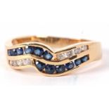 A 14ct sapphire and diamond ring, the two strand crossover style ring set with small round sapphires