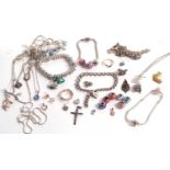 A quantity of silver and white metal jewellery to include Pandora bracelets, necklaces, pendants,