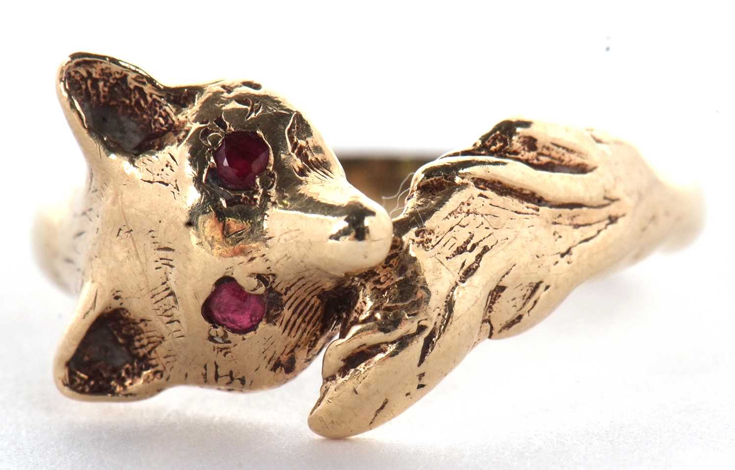 A 9ct fox ring, the fox head set with red hardstone eyes, curling round with tail meeting at other - Image 2 of 10