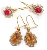 Two pairs of gemset earrings, the first set with oval synthetic rubies surrounded by white stones,