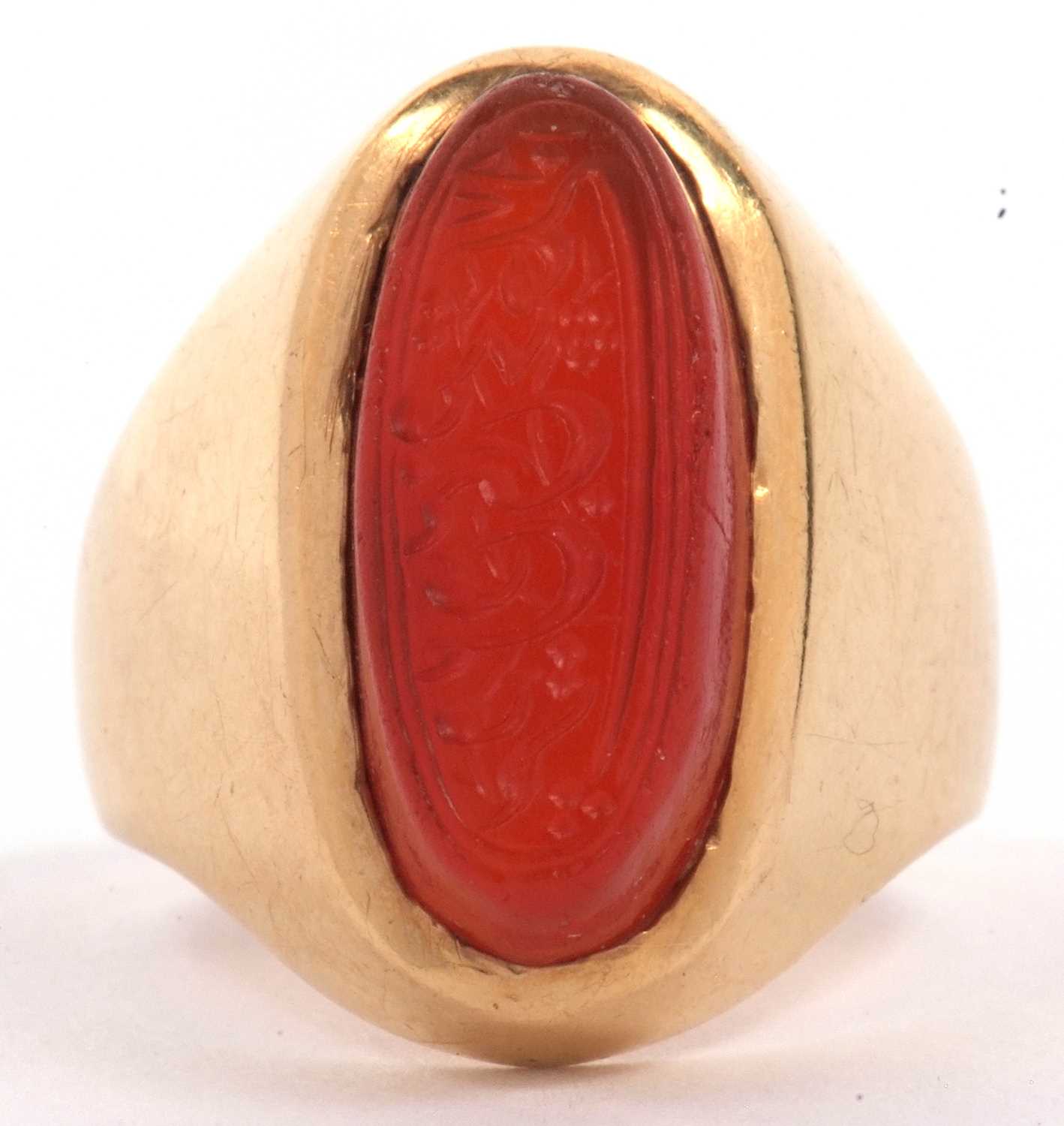 High grade yellow metal and carnelian set ring, the elongated oval shaped carnelian carved with - Image 2 of 7