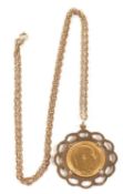 A 1908 half sovereign necklace, the 1908 half sovereign in 9ct mount, on unmarked yellow metal