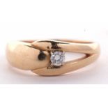 A 14 diamond ring, the round brilliant cut diamond set, with plain tapering band stamped 14, size R,