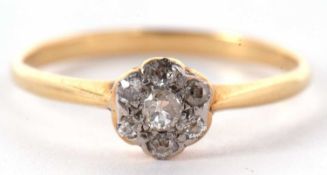 An 18ct diamond flowerhead cluster ring, the flowerhead cluster set with old cut diamonds, approx.