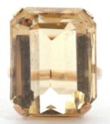 A 9ct citrine ring, the emerald cut citrine, approx. 21 x 16 x 12mm, in a four claw mount and