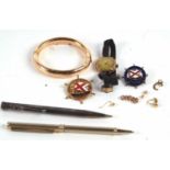 A mixed group of jewellery to include a lady's 9ct cased wristwatch, an S.S. Empire Trooper badge,