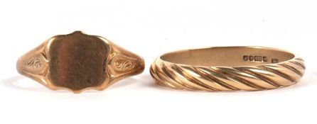 Two gentleman's 9ct gold rings: an unmarked signet ring, size X, and a twisted style band, size Z+6,