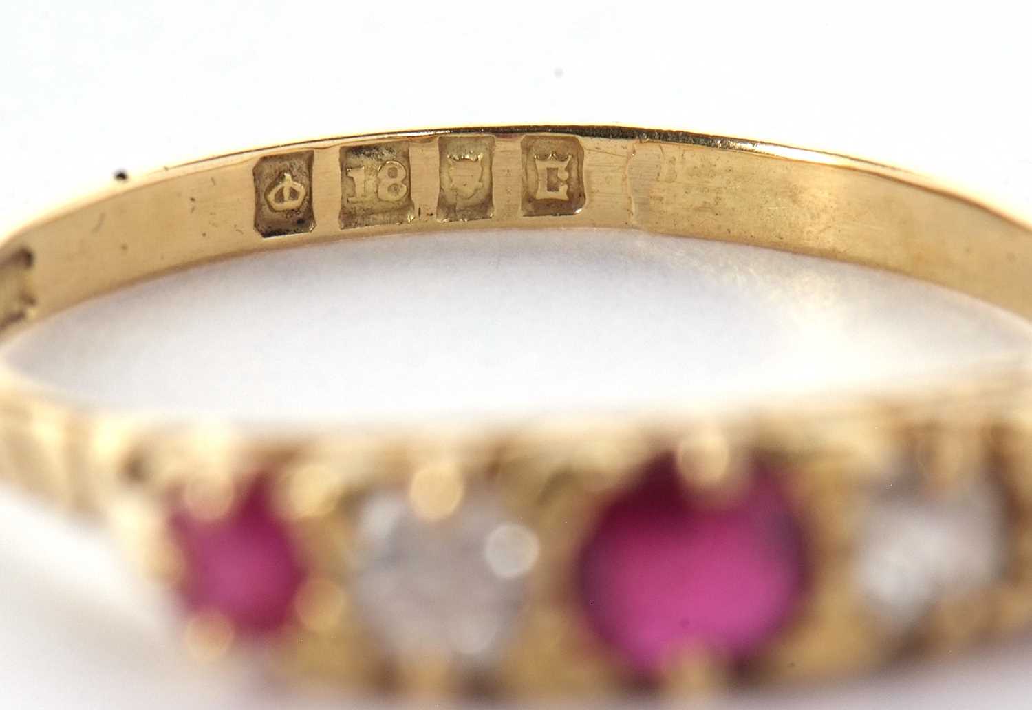 An early 20th century 18ct ruby and diamond ring, the alternating round, graduated rubies and - Image 7 of 10