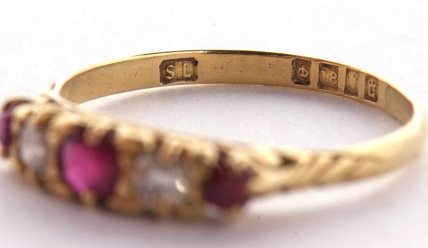 An early 20th century 18ct ruby and diamond ring, the alternating round, graduated rubies and - Image 9 of 10