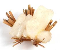 A contemporary 9ct quartz brooch, the natural quartz crystal set with further spikes of 9ct gold,