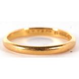 A 22ct gold wedding ring, a plain polished design, hallmarked for Birmingham 1947, 2.5 gms