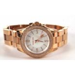 Michael Kors lady's rose gold-tone quartz wristwatch, model MK5403, with mother of pearl face, baton