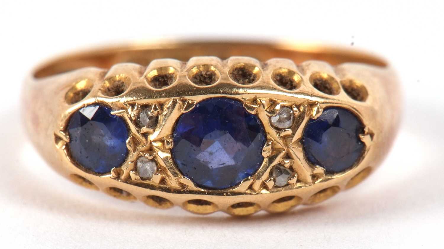 An 18ct sapphire and diamond ring, the three round sapphires set with diamond highlights, with - Image 2 of 8