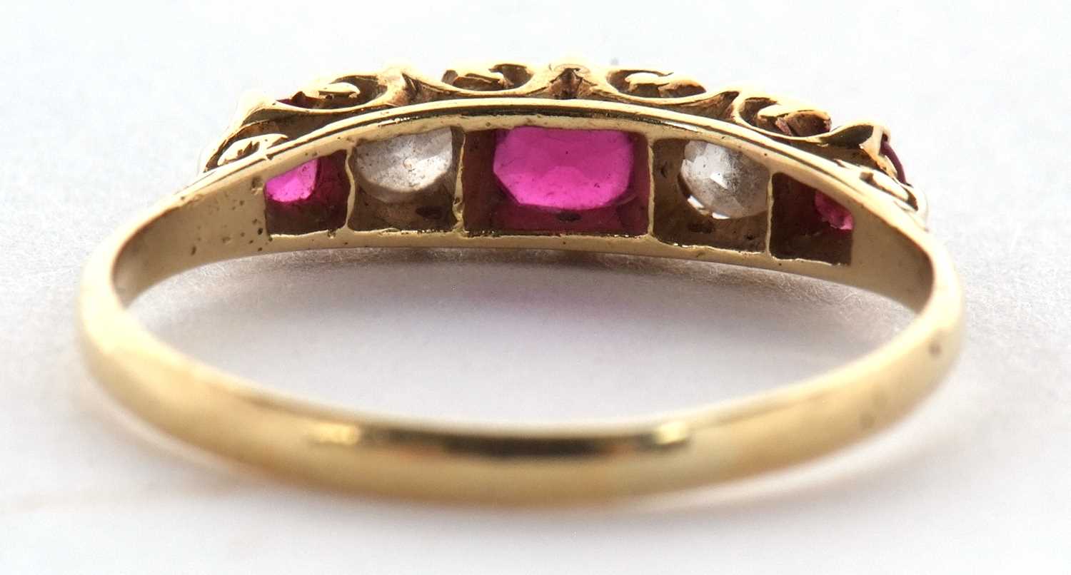 An early 20th century 18ct ruby and diamond ring, the alternating round, graduated rubies and - Image 5 of 10