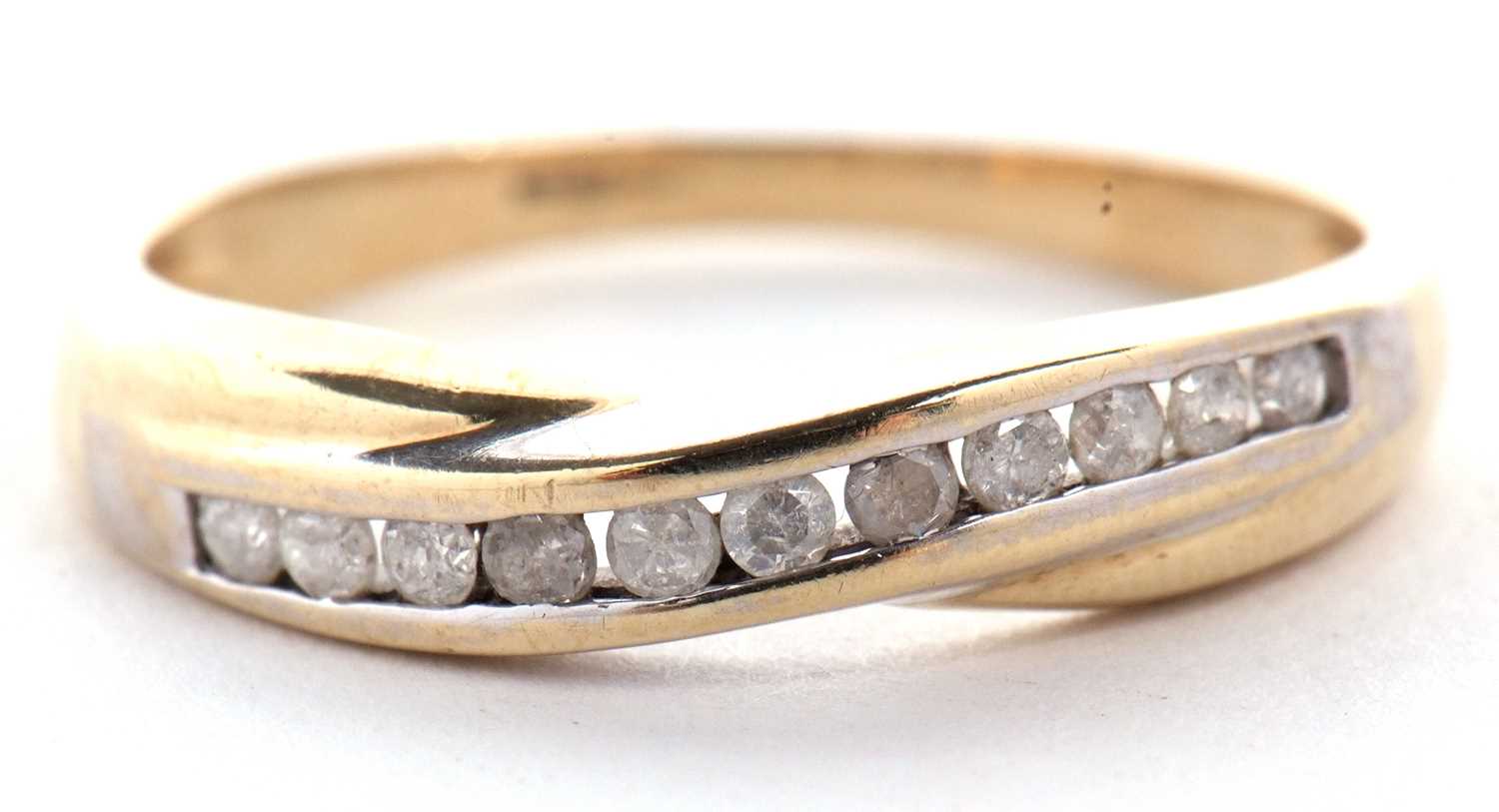 A 9ct diamond crossover ring, the round brilliant cut diamonds, channel set in a crossover style - Image 2 of 8