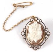 A cameo brooch, the oval shell cameo carved in high relief with a portrait bust of a classical