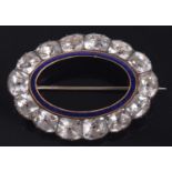 A 19th century white stone and blue enamel brooch, the inner oval blue enamel ring in yellow metal