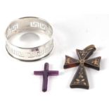A tortoishell pique work cross pendant, together with a purple paste cross pendant and a silver