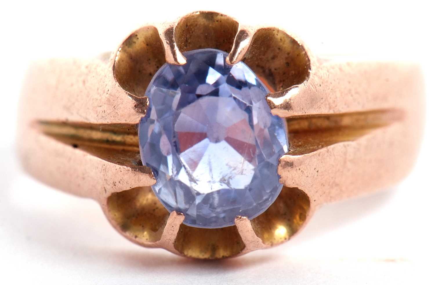 A gentleman's 18ct pale blue sapphire ring, the oval old cut sapphire, approx. 8.8 x 7.5 x 7.2mm,