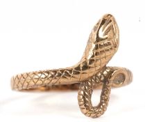 A 9ct snake ring, the naturalistically modelled snake with half textured band, stamped 375, hallmark