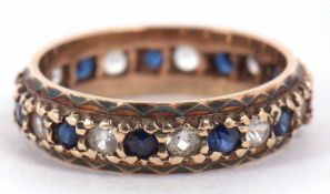 A 9ct gold full eternity ring alternate set with blue and white small stones, size L/M