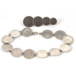 A threepence coin bracelet and a coin brooch, 23g gross