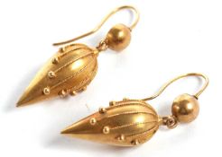A pair of late 19th century Etruscan revival style earrings, the pear shape drops with rope twist
