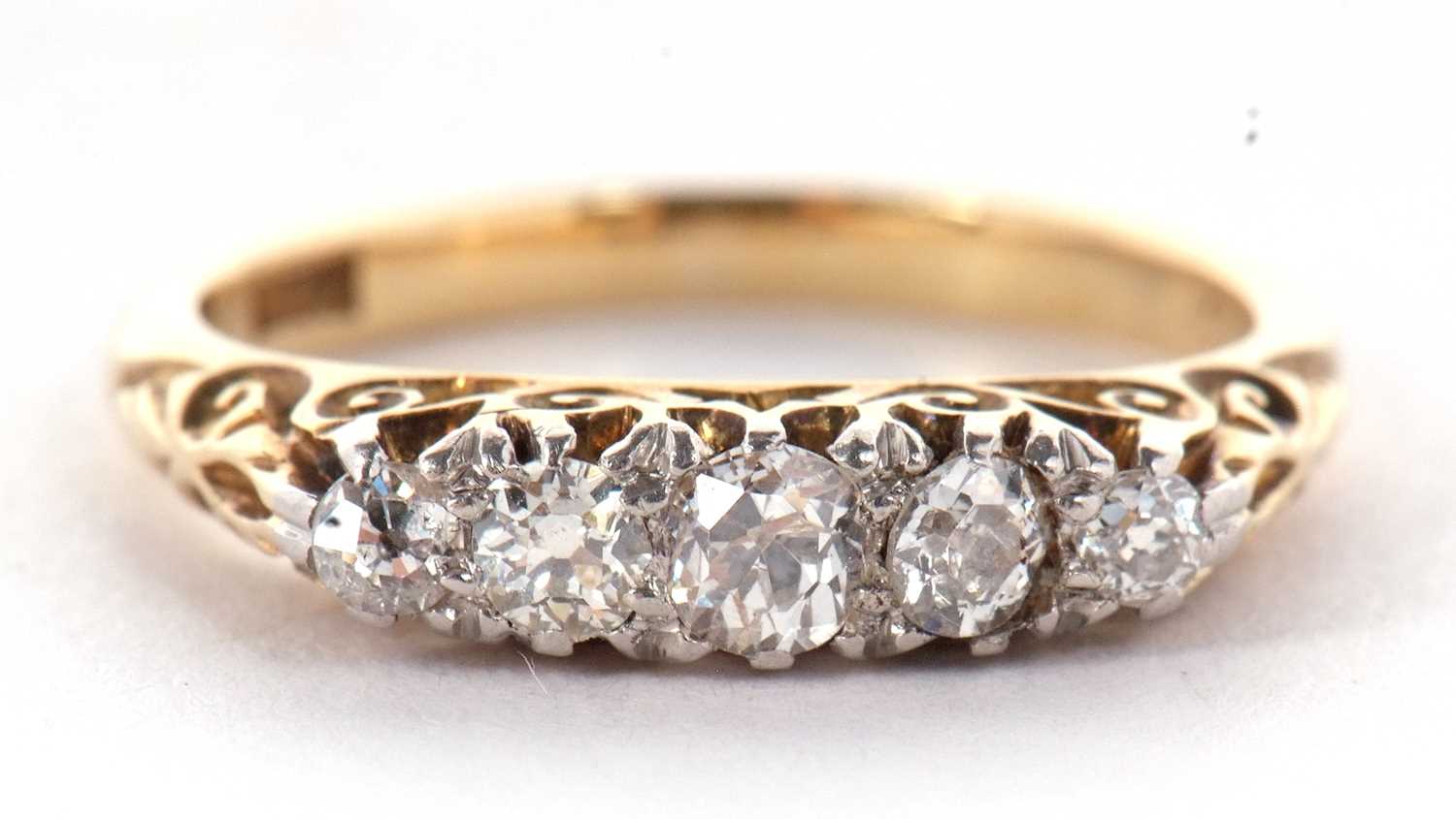 An 18ct five stone diamond ring, the five graduated old round brilliant cut diamonds, set with - Image 2 of 12