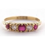 An early 20th century 18ct ruby and diamond ring, the alternating round, graduated rubies and