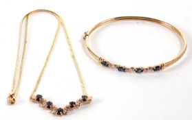 A 9ct sapphire and diamond necklace and matching bangle, the necklace set with oval sapphires and